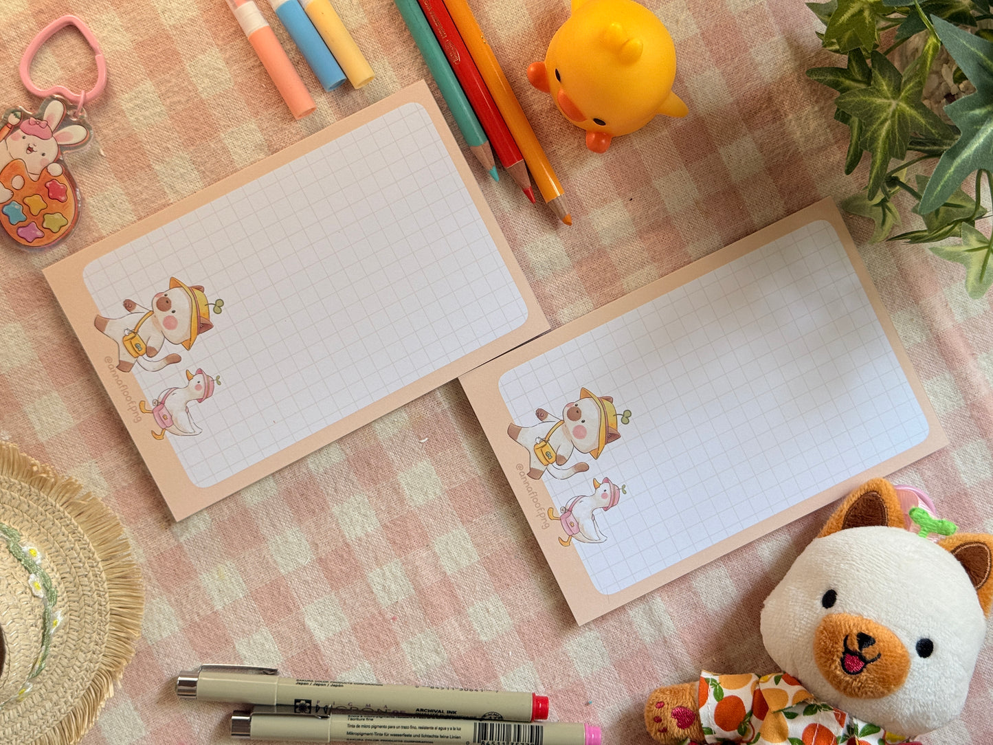 Moss and Tilly strolling notepads