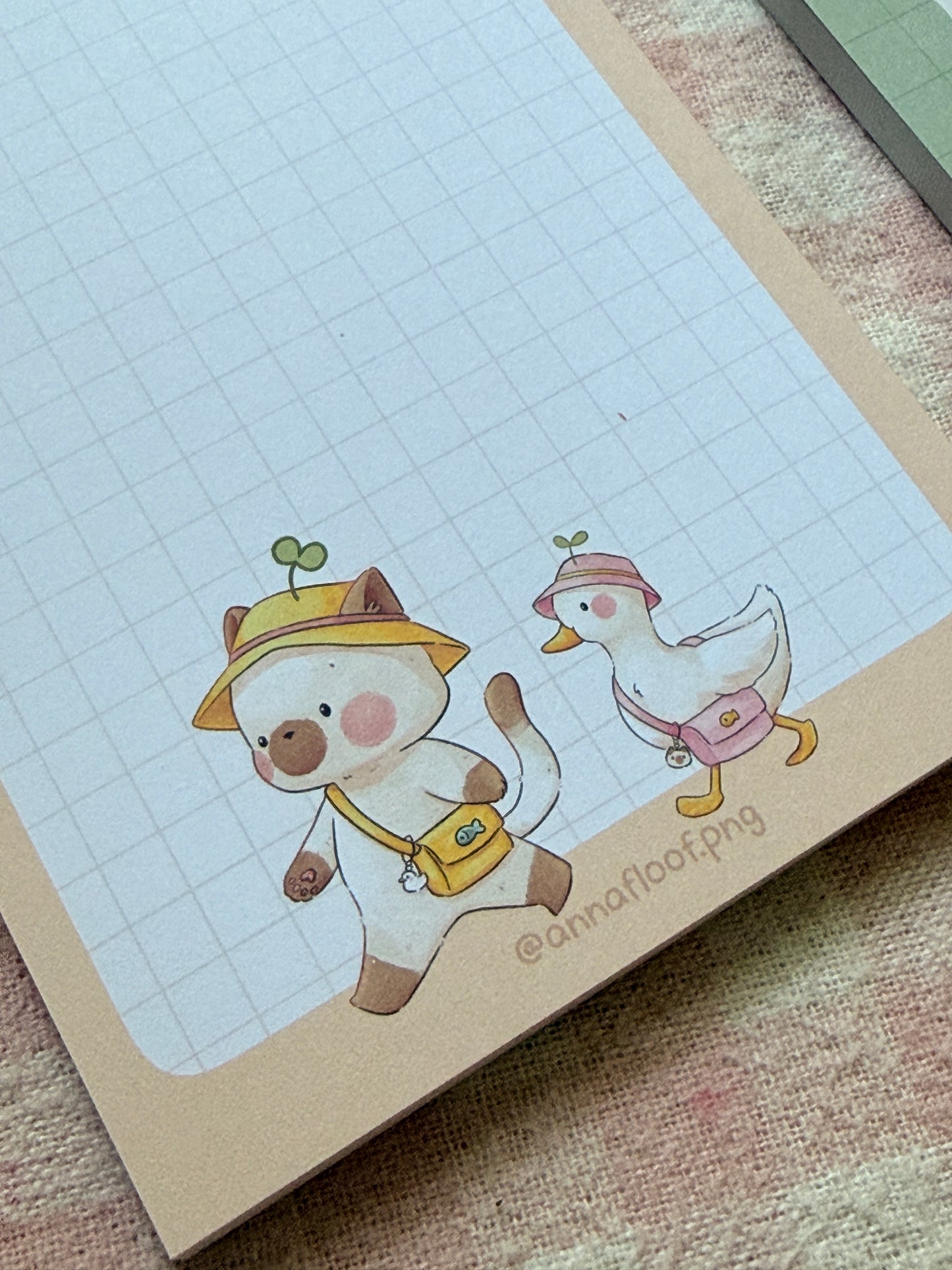 Moss and Tilly strolling notepads