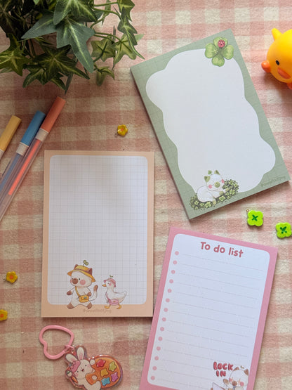 Moss and Tilly strolling notepads