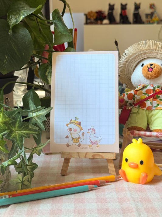 Moss and Tilly strolling notepads